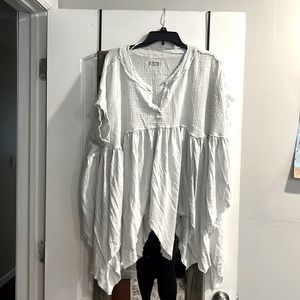 White lyrical asymmetrical tunic